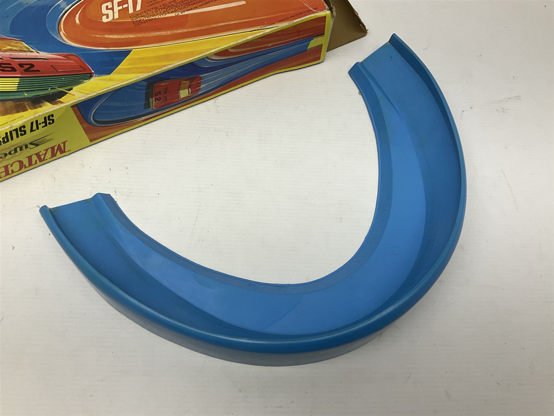 Matchbox Superfast track racing Set with Superbooster and two boxed SF-17 Slipstream Curves; together with five boxed Superfast models - 3d Monteverdi Hai, two 7d Hairy Hustler, 45c Ford Group 6 and 66d Mazda RX500; and quantity of unboxed and playworn other die-cast models