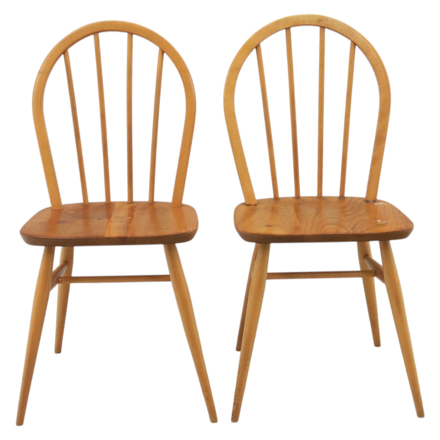 Ercol - set of four 'Windsor' waxed elm chairs, with hoop back design, on tapering supports