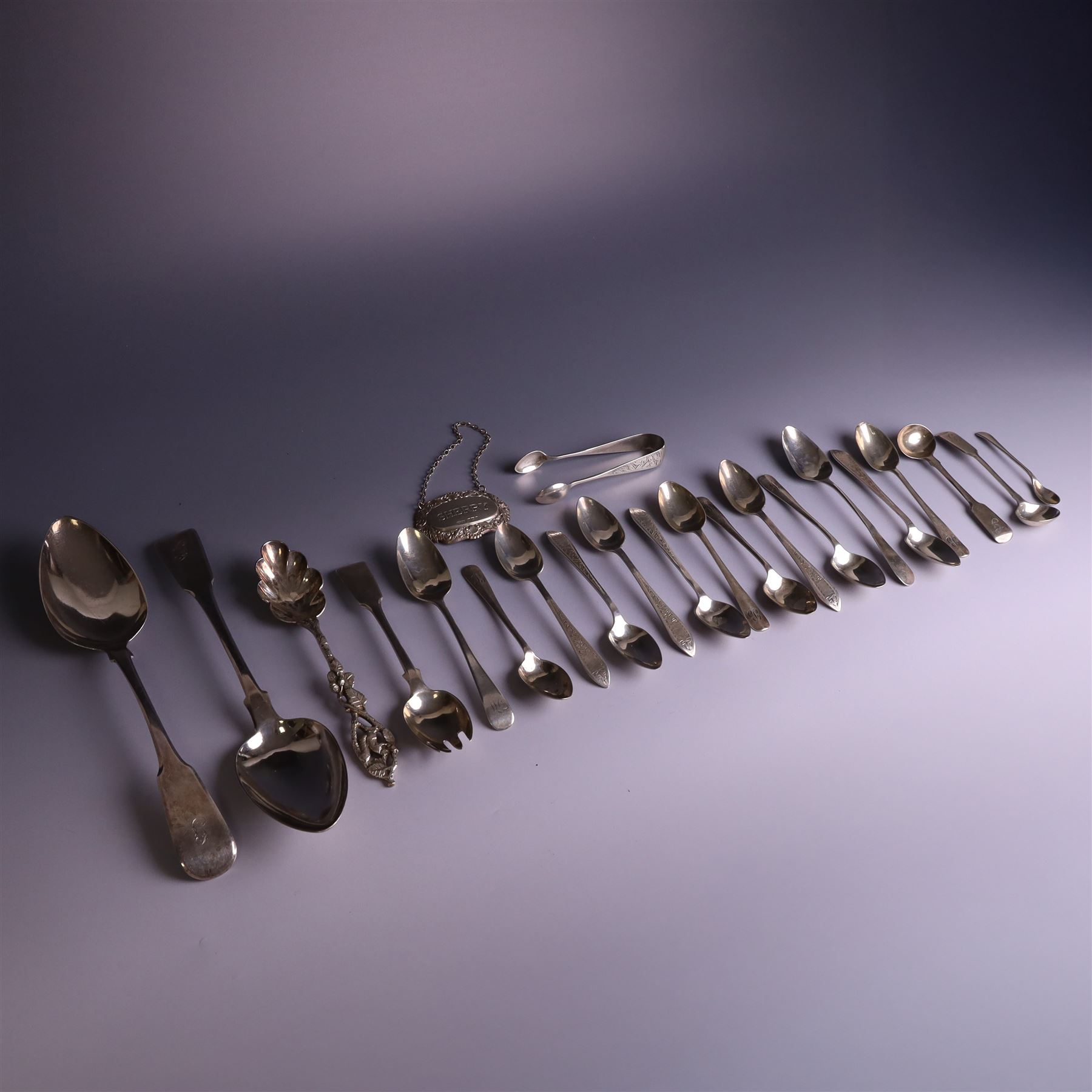 Collection of silver flatware, including pair of George III Fiddle patter table spoons and set of six Edwardian teaspoons with ivy decoration and matching sugar tongs, together with a silver 'Sherry' decanter label