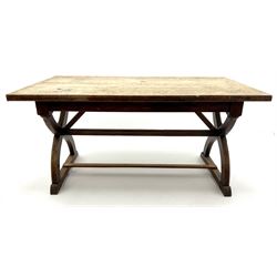 Early 20th century rectangular oak dining table, ‘X’ shaped supports joined by stretcher on sledge feet 