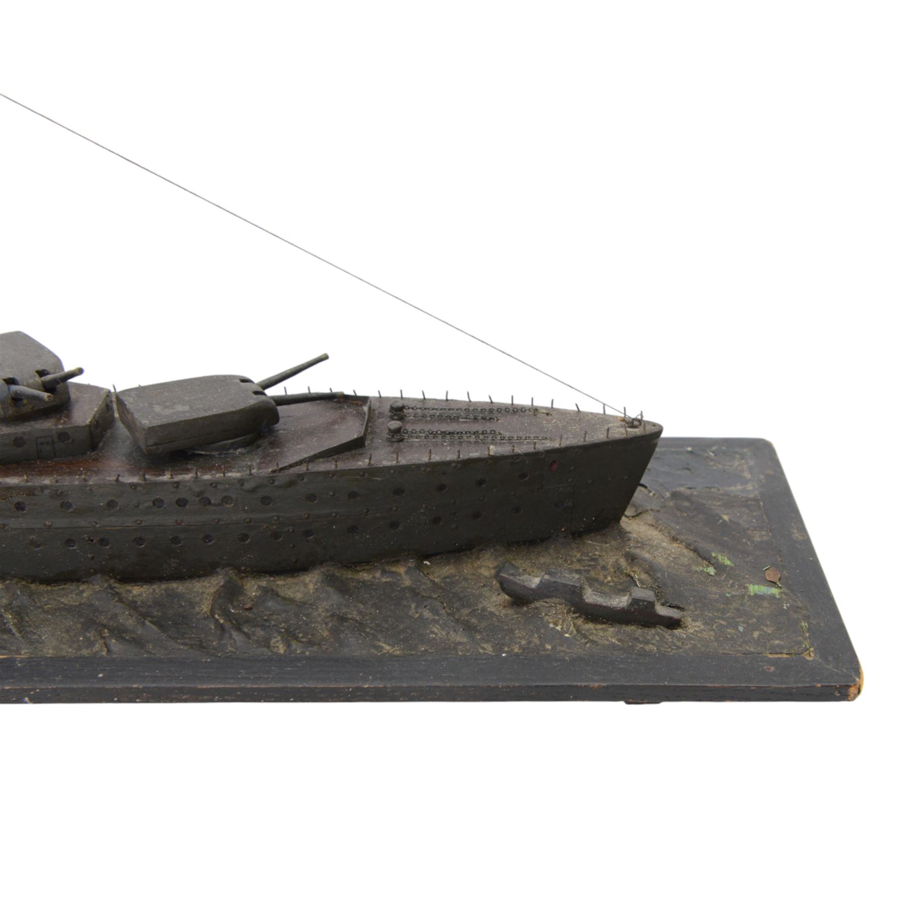  HMS Exeter, Waterline wartime metal model upon a wooden base, circa 1939-45, H24cm, L82cm  