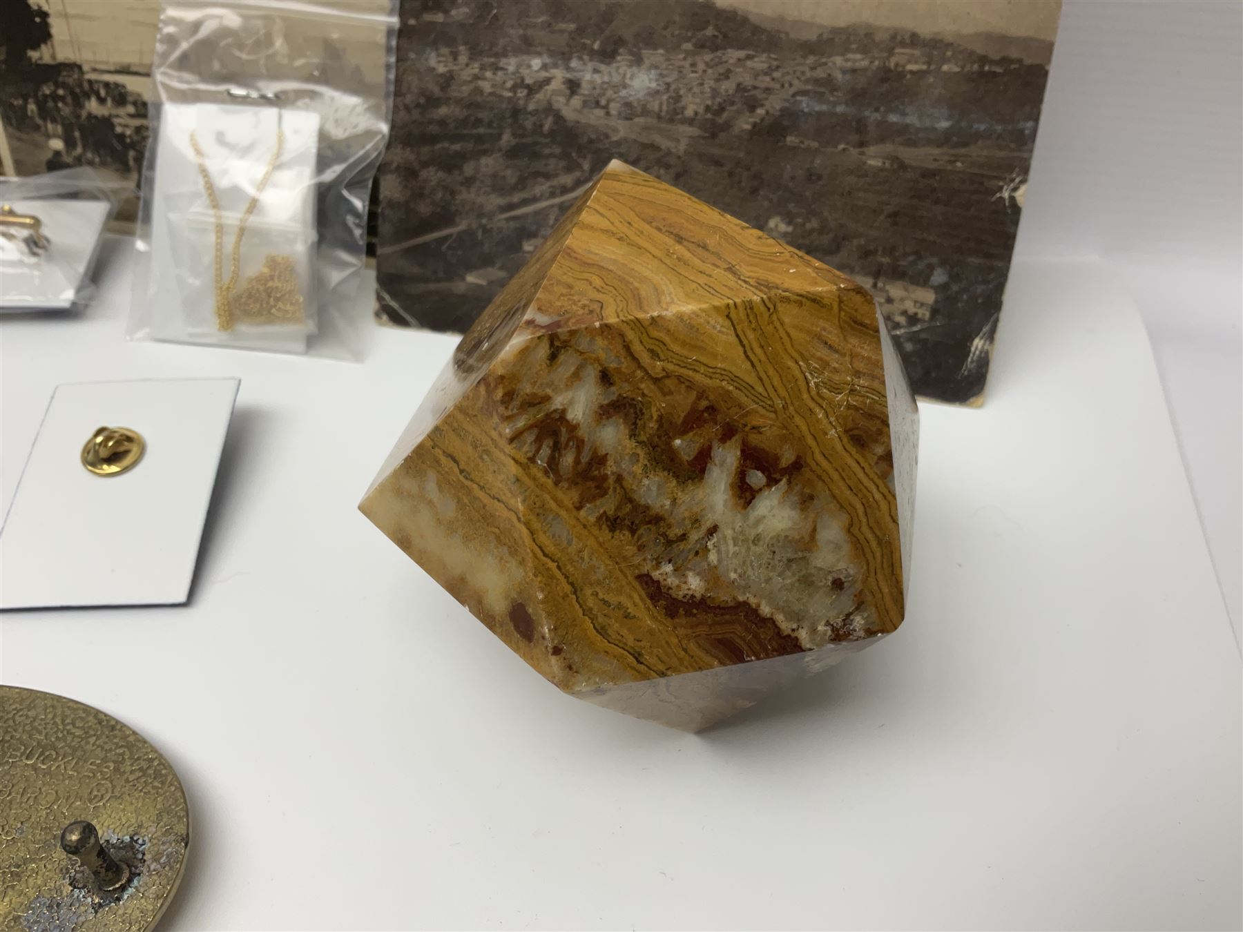 Studio Danielle Old English Sheepdog jewellery including two pairs of cufflinks, necklace and pin, together with similar belt buckle, hardstone tetradecahedron paperweight, postcards and an Imperial War Museum Falklands Conflict coin