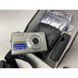 Quantity of camera accessories and equipment, to include boxed Canon EFS 17-55mm IS lens, Canon 59s camera, Olympus camera, etc