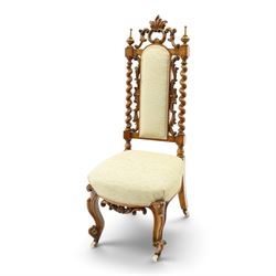 Victorian carved walnut side chair, the ornate high back with pierced and carved scrolled ...