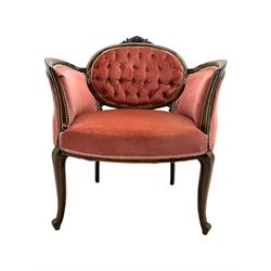 Edwardian inlaid rosewood parlour suite, comprising pair of tub shaped armchairs (W77cm, D69cm, H88cm); and matching two-seat sofa (W112cm, D69cm, H88cm), each with carved crest rails with shell motifs, deep button-tufted oval backs upholstered in pink fabric with braid trim, on cabriole supports