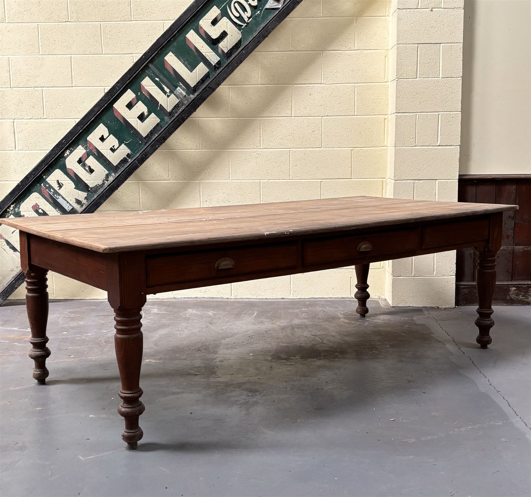 Stained pine dining table, late 19th century and later, the rectangular top above three drawers and three dummies, raised on ring turned and tapered supports.H80cm, 245cm x 119cm.  - COLLECTION BY APPOINTMENT FROM: The White House, Thirsk Road, Easingwold, York, YO61 3NF - CALL 01723 507111 TO ARRANGE