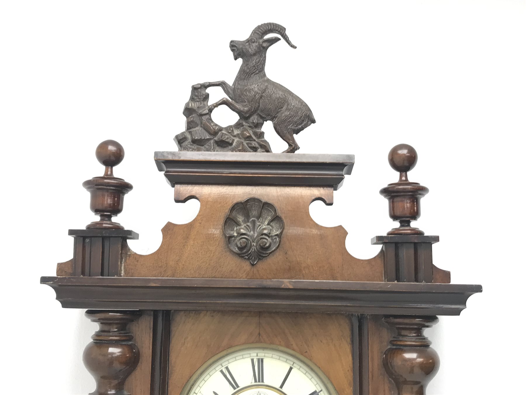 Late 19th century Vienna type wall clock in walnut case,  figural pediment above glazed door with half turned pilasters, single weight driven movement stamped '159964', H132cm