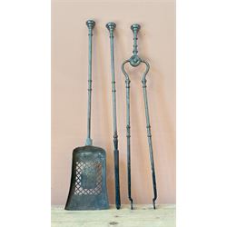 Trio of 19th century steel fire irons with knop finials, comprising poker, shovel, and tongs. L67cm.