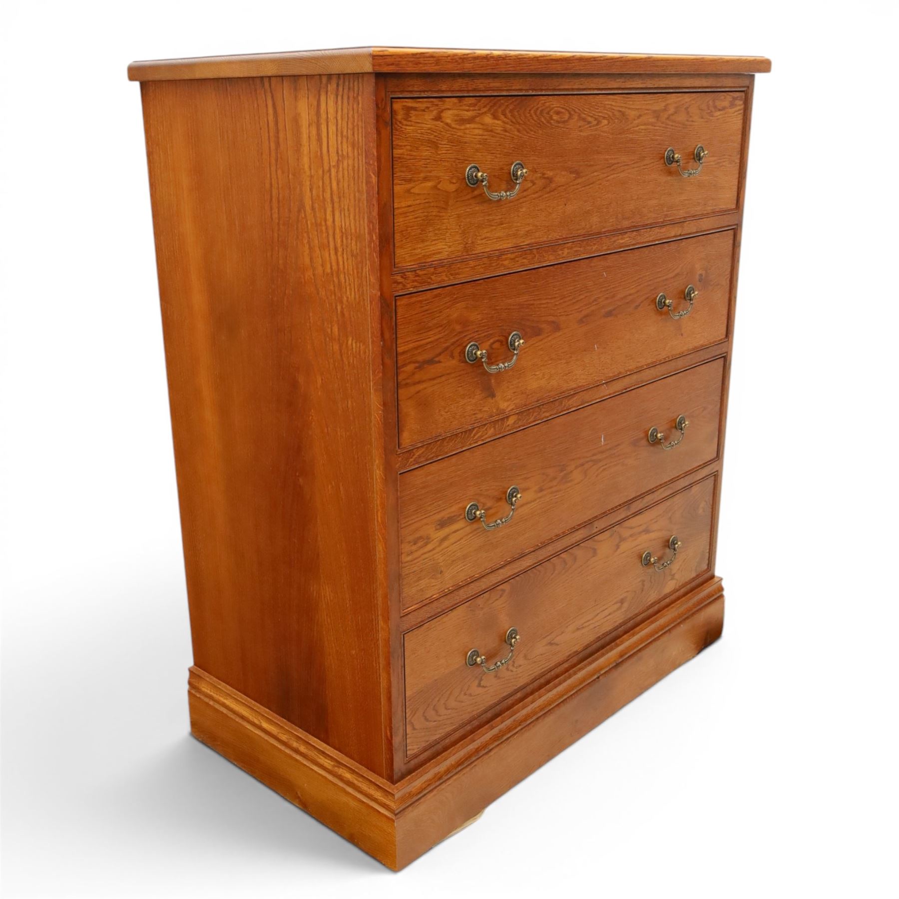 Cabinet-made oak chest, fitted with four soft-close drawers, brass swan neck handles and pierced backplates, on bracket feet