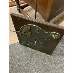 Early 20th century ‘HMV' 202 cabinet gramophone, oak cased, moulded top with foliate carved moulding hinges to reveal gramophone, two doors enclosing horn, on turned supports joined by moulded stretcher rails