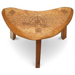Gnomeman - oak Yorkshire rose milking stool, adzed surface with carving of a Yorkshire rose, exposed wedged through tenons, square legs with chamfered edges, with signature carving of a Gnome, by Thomas Whittaker of Littlebeck