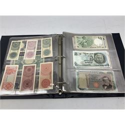 World banknotes, including Queen Elizabeth II The States of Jersey one pound 'DB202703', five pounds 'BB527762' and ten pounds 'AB651481', reserve bank of New Zealand two dollars '1L3 741894', King George V Straits Settlements one dollar 1st January 1935 'F/83 28924', various Bank of England notes etc, housed in two ring binder albums