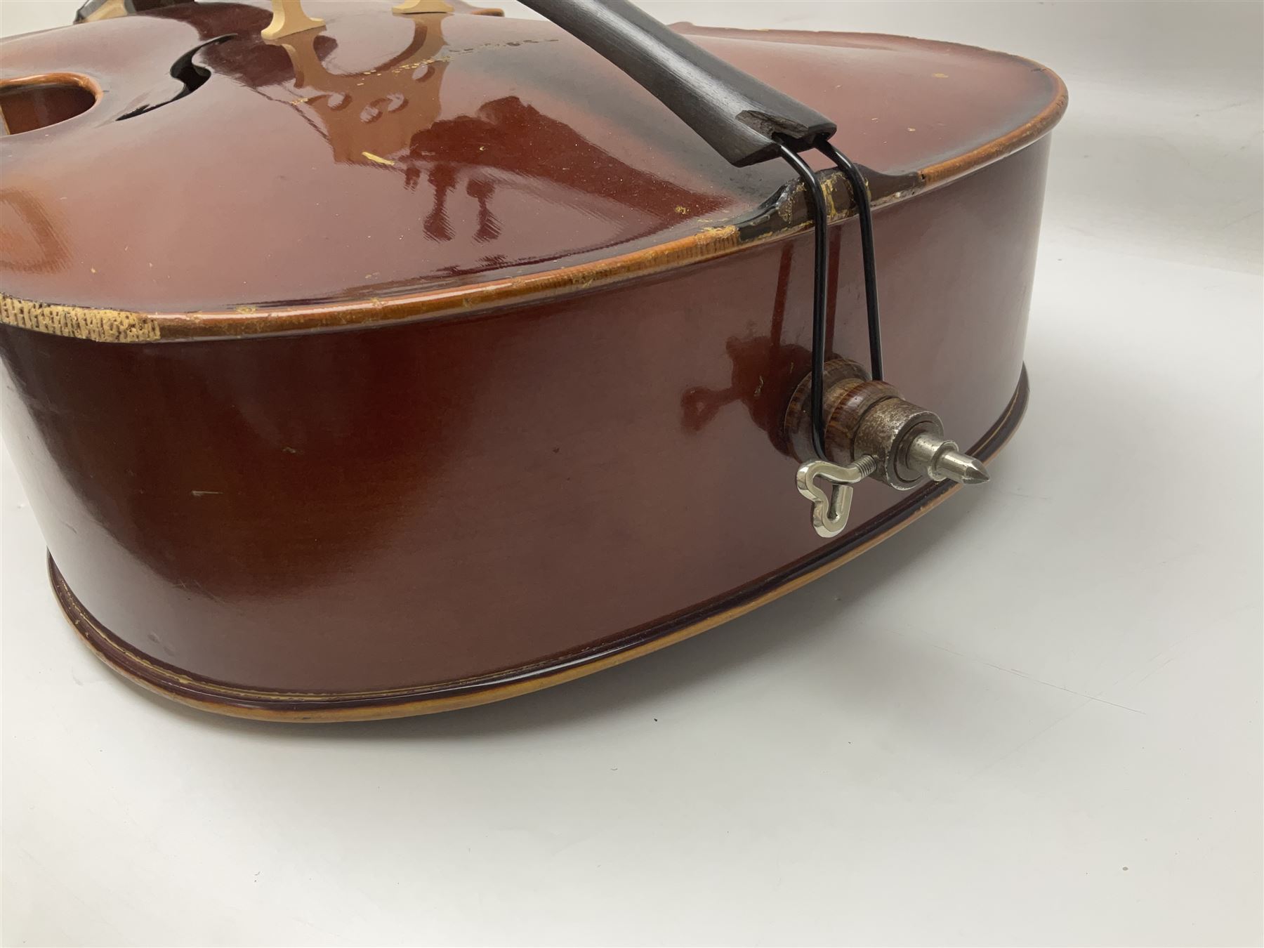 Two student half-size cellos - Boosey & Hawkes Artia with 65cm one-piece back and spruce top; bears maker's label; L104cm overall; and Romanian with 65.5cm two-piece maple back and ribs and spruce top; bears label; L108.5cm overall; each in soft carrying case with two bows (2)