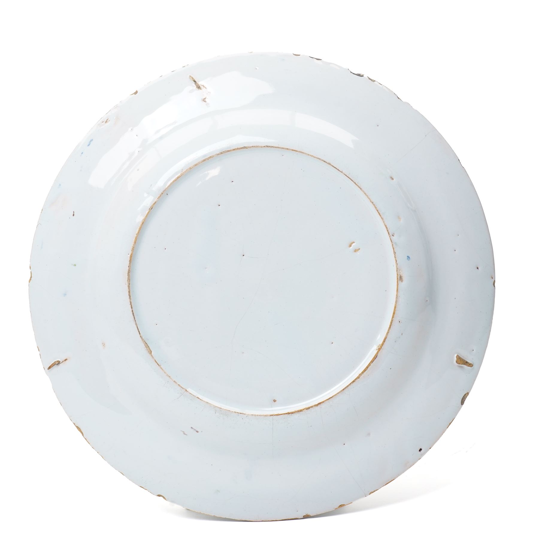 18th Century English Delft plate, probably Lambeth c1750, painted with a parrot on a branch among foliage, D22.5cm