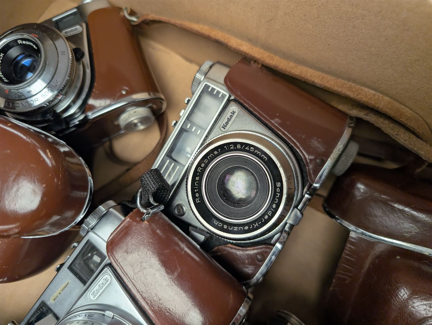 Eight Kodak Retinette cameras and similar, including IA, IB, IIIS models, most in leather cases
