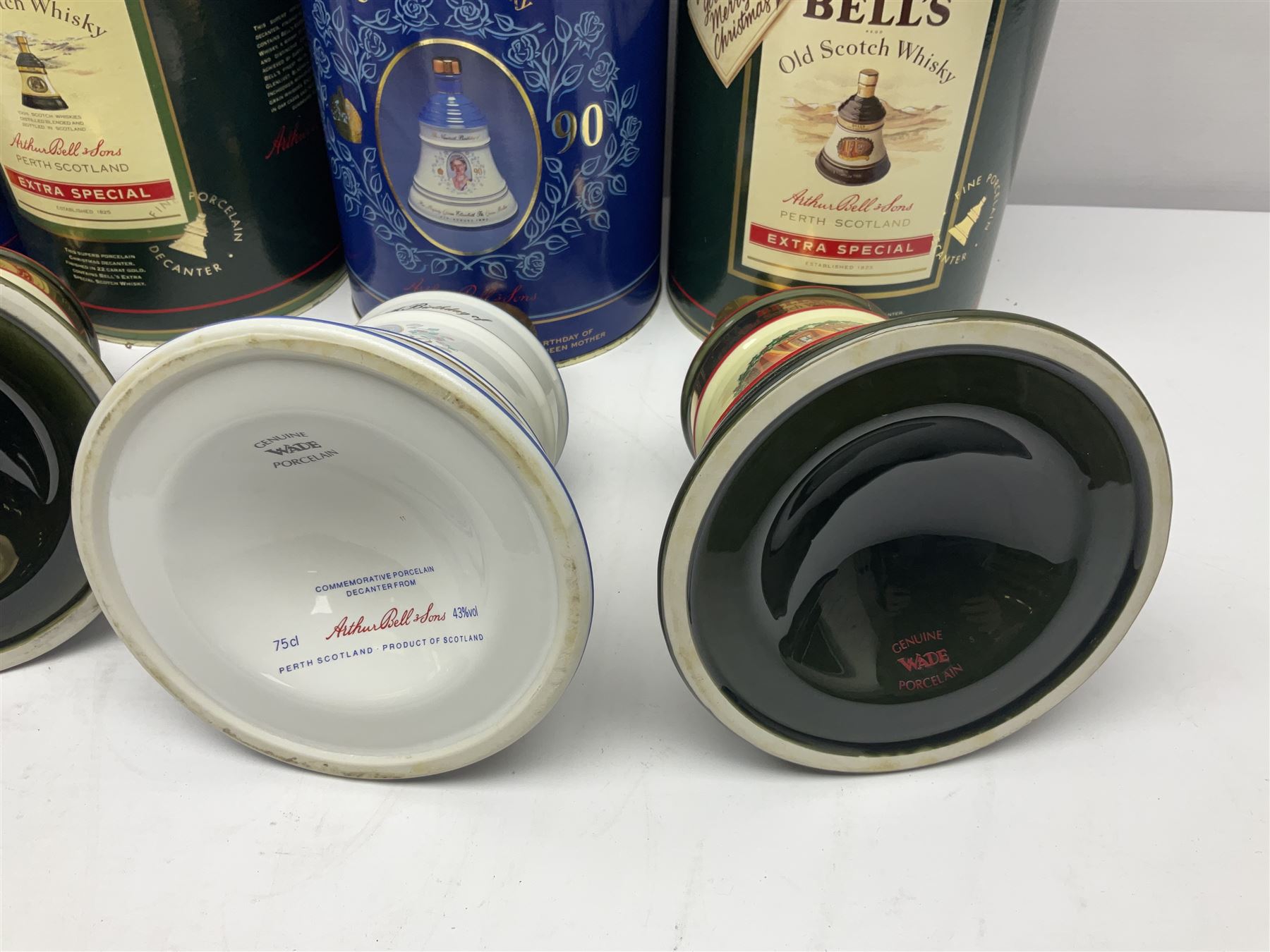 Bells, Scotch whisky, in seven Wade ceramic decanters, including Christmas 1988, 1989, 1990, 1991 etc