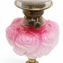 Victorian brass column table oil lamp with pink glass reservoir and etched shade H61cm and a smaller lamp with opaque shade