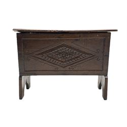 18th century and later boarded oak chest, the rectangular hinged lid with front mould and chip-carved decoration, sloped front carved with stylised lozenge, shaped end supports