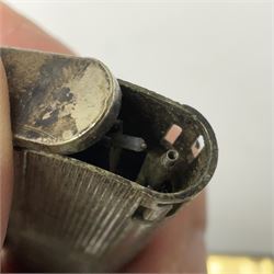 Collection of lighters, including Ronson Varaflame, Zorr Classic, Dunhill bark effect roller gas lighter, and faceted blue glass table lighter, etc