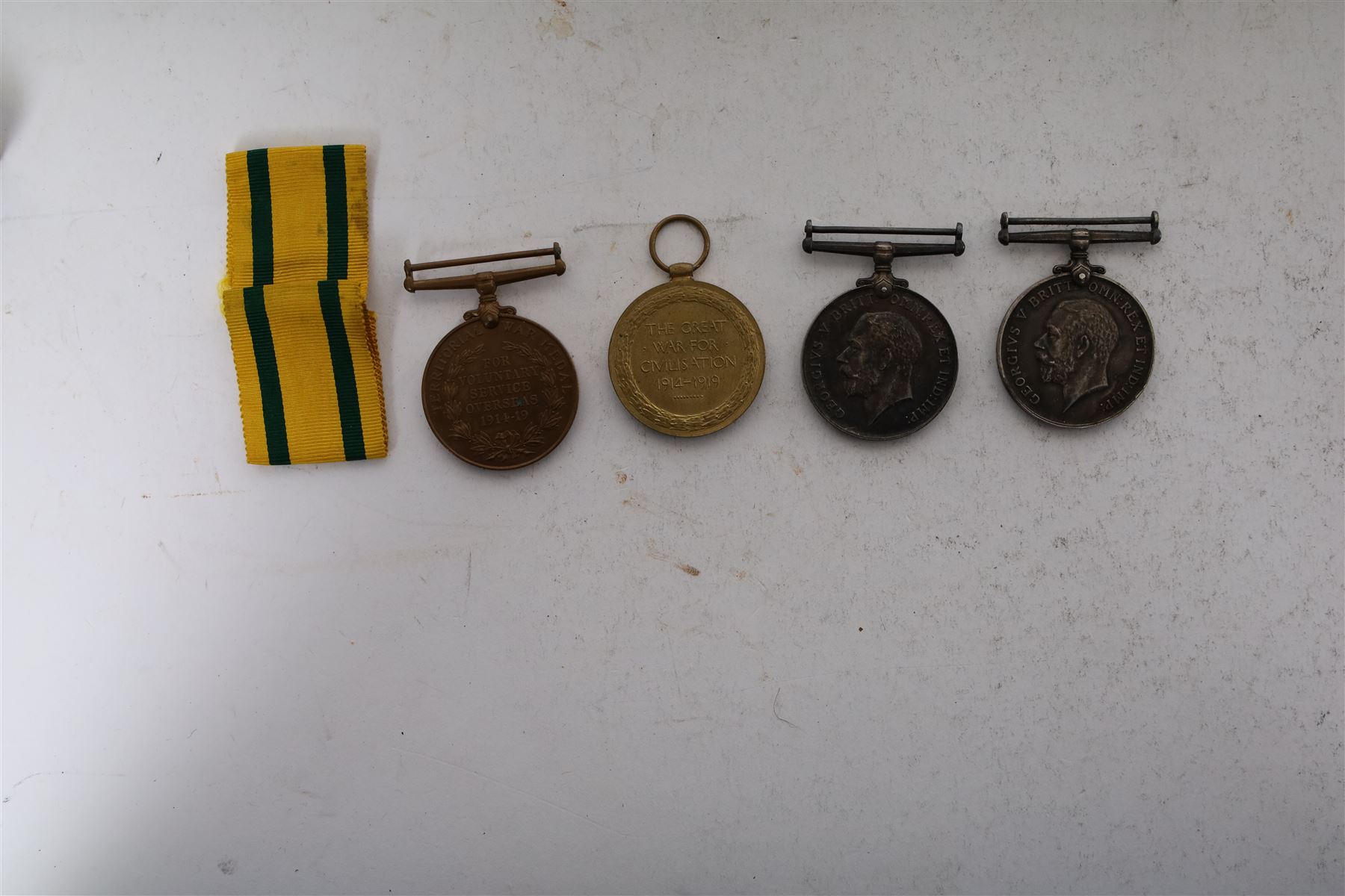 WWI trio of the War, Victory and 1914-1918 Mercantile Marine medal, awarded to 6376 Pte T Pickering Leic R, togehter with WWI war medal awarded to 19292 Pte F.G. Elliot C.GDS