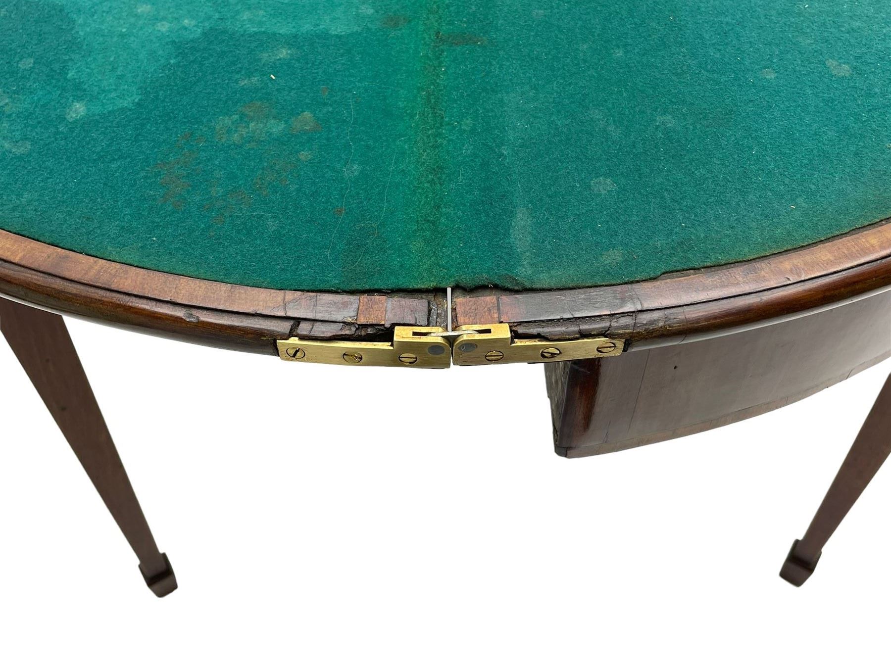 George III inlaid mahogany card table, demi-lune fold-over top with satinwood band and large fan motif, baize lined interior, double gate-leg action base, on square tapering supports with spade feet
