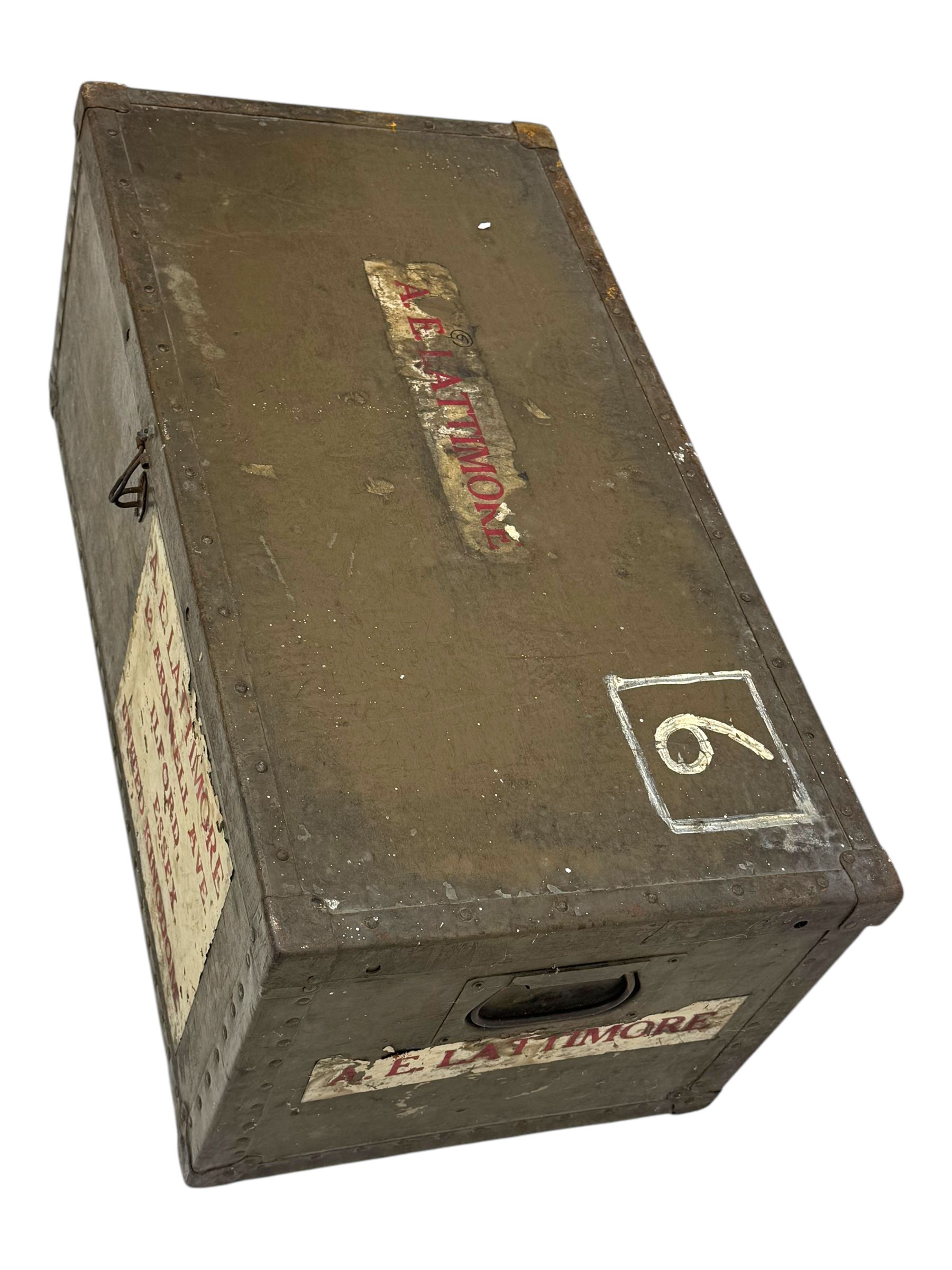 Vintage metal bound steamer trunk, exterior labels reading 