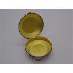 Modern silver and enamel pill box, of circular form the hinged cover decorated with central geometric panel, opening to reveal a gilt interior, with engraved initials to underside, hallmarked Martyn Pugh, Birmingham 1992, 1.15 ozt (36 grams)