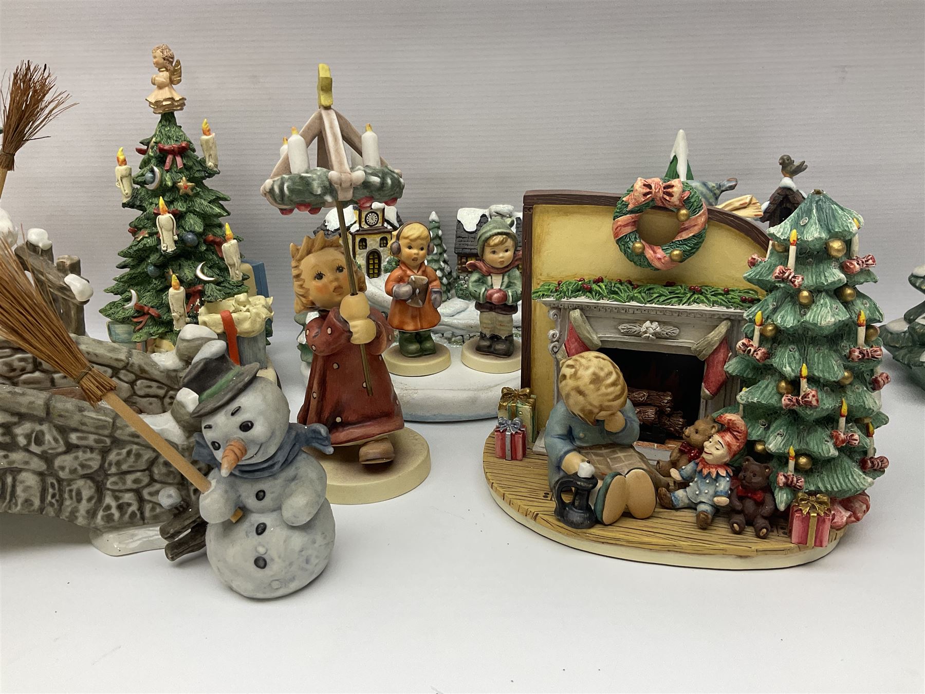 Large collection of Christmas themed Hummel figures and Hummel scapes by Goebel, to include Winter Friend, Making New Friends, Tree Trimming Time, Winter Adventure etc