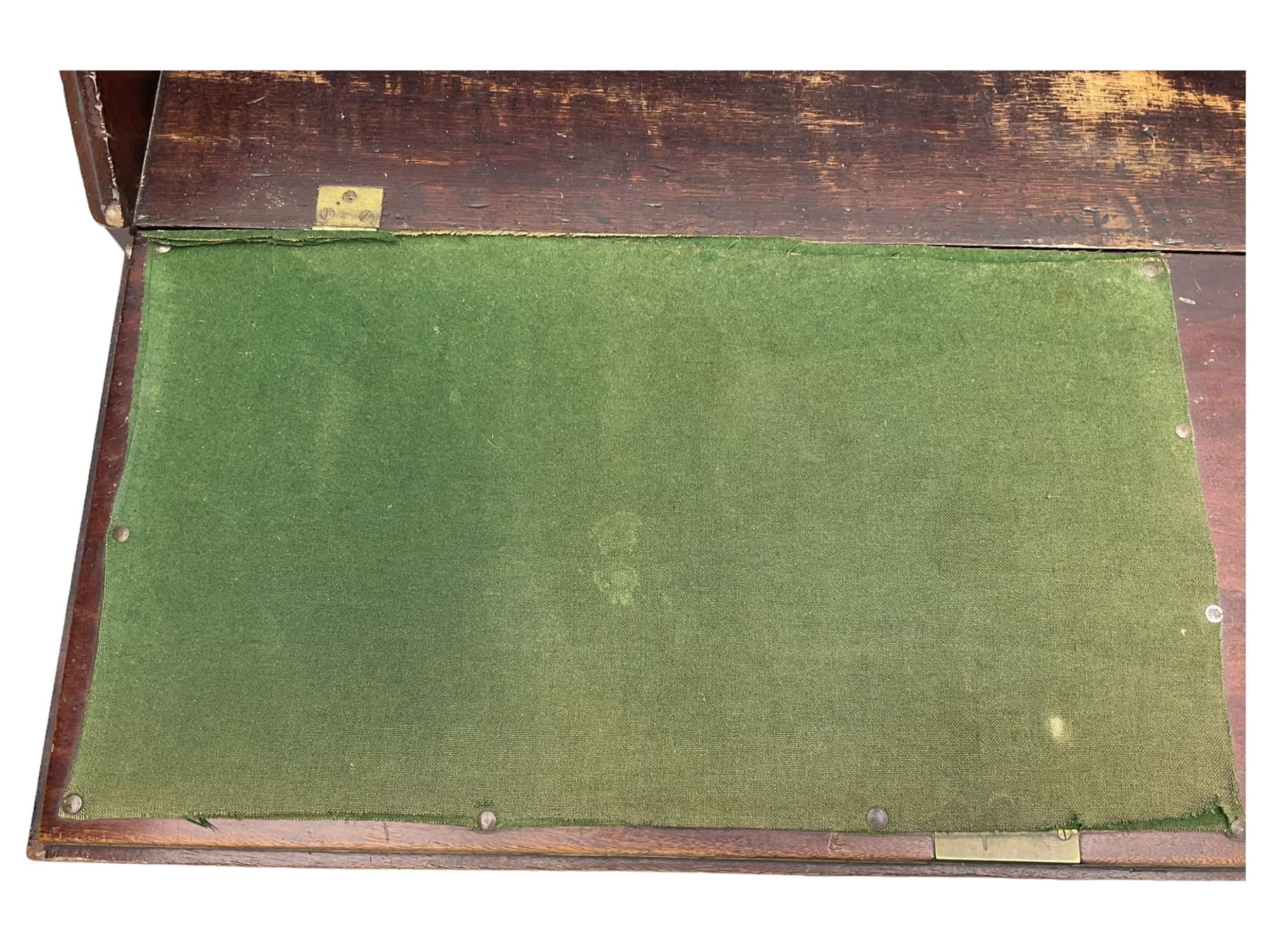 George III mahogany bureau, the conch inlaid fall front enclosing pigeon holes, shelves and central cupboard with inlaid flower motif, four graduating cock-beaded drawers below each with brass handles, lower moulded edge over shaped bracket feet