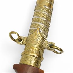 Moroccan jambiya, the metal scabbard decorated in gilt and silver and with hardwood grip L41cm overall
