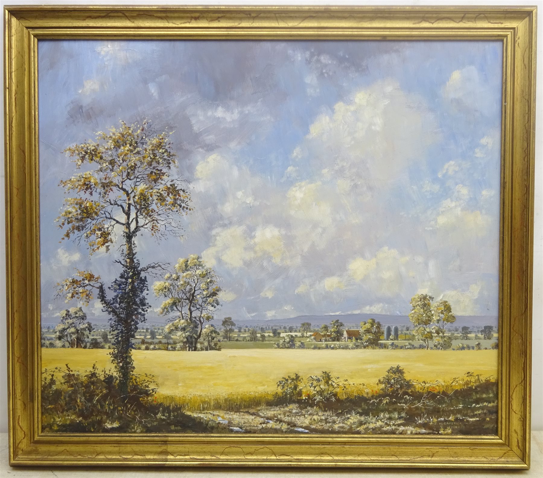 John H Capstick (British 20th century): 'Ryedale Scene', acrylic on board signed, titled and dated 1988 verso 59cm x 69cm