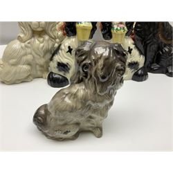 Two Pairs of Staffordshire style dogs, together with three other examples, largest example H27cm