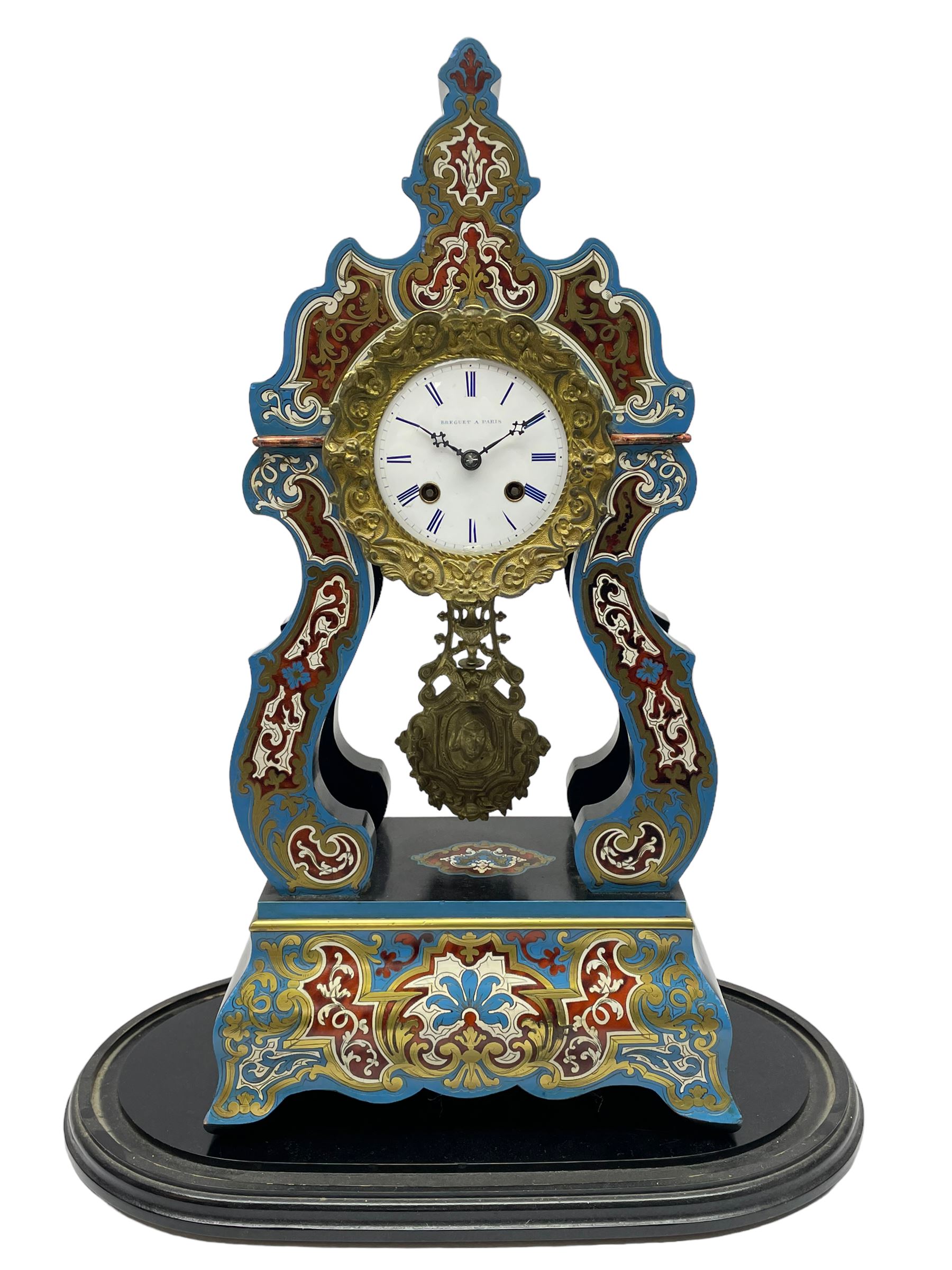 Breguet A Paris - Mid-19th century 8-day French portico clock, ebonised case with brass and cloisonne inlay, on a rectangular plinth with a shaped base, white enamel dial with blue Roman numerals, minute track and steel trefoil hands, cast brass bezel with scroll and foliate decoration and a conforming gridiron pendulum, twin train going barrel movement with a countwheel strike sounding the hours and half-hours on a bell, with an ebonised base and glass dome. 