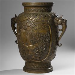Japanese Meiji-Taisho period bronze vase, by Kanaya Gorosaburo, decorated with dragons and other creatures in a landscape, seal mark to base, H35.5cm 