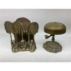 Collection of victorian and later brass desk accessories, to include a letter holder with cherub design, ink well of square form with hinged lid, brass table bell, brass casket with relief decoration, etc  