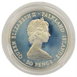 The Royal Mint Falkland Islands 1983 '150th Anniversary' sterling silver fifty pence coin and  1985 '100 Years Of Self Sufficiency' twenty-five pounds sterling silver proof coin, both cased with certificates