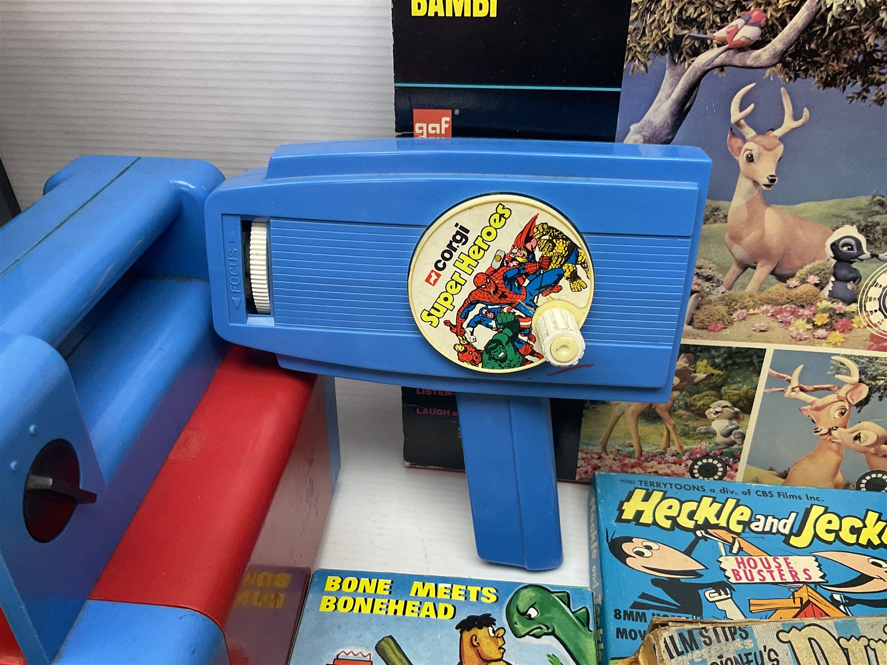 Corgi/Disney - Movie Vision, in original box, with Corgi projector, two Corgi Movie Viewers and nine films; together with 8mm film reels and strips to include Disney’s Dumbo, Mickey Mouse, Alice in Wonderland etc, most in original boxes