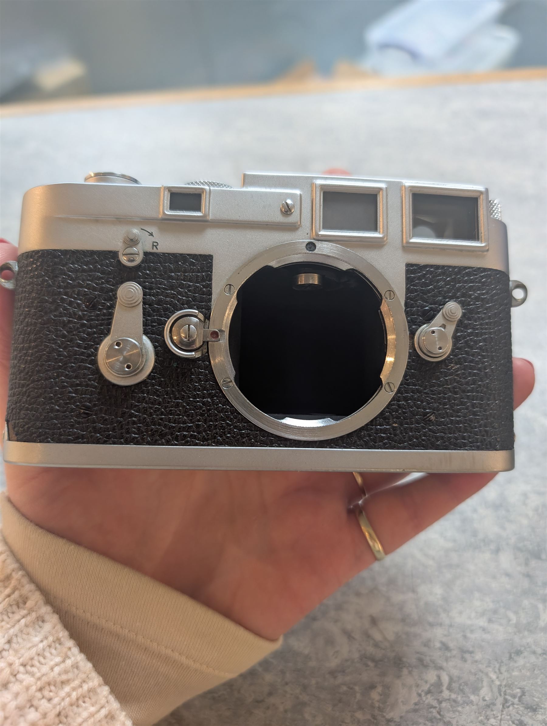 Leica DBP M3 35mm rangefinder camera body, serial no. 1038356, circa 1961, in chrome finish, housed in brown leather Leica case, with a Leitz Wetzlar Sunnilux 1:1.4/50 lens serial no. 1845148, Leitz Wetzlar Elmar 1:4/135 lens serial no. 1825980, 12575N hood, 12521G hood, Leica Meter MC serial no. 99015, Sunpak Auto28 SR Thyristor, Linhof 3 Way Pan tripod, and a Toshiba PE-1 Linear Exposure meter, all housed in an Original Benser Everready Case, most items with instruction booklets 