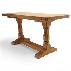 Mouseman - adzed oak rectangular refectory style coffee table, with rectangular adzed top, raised on octagonal supports united by a stretcher, with carved mouse signature, by the workshop of Robert Thompson of Kilburn