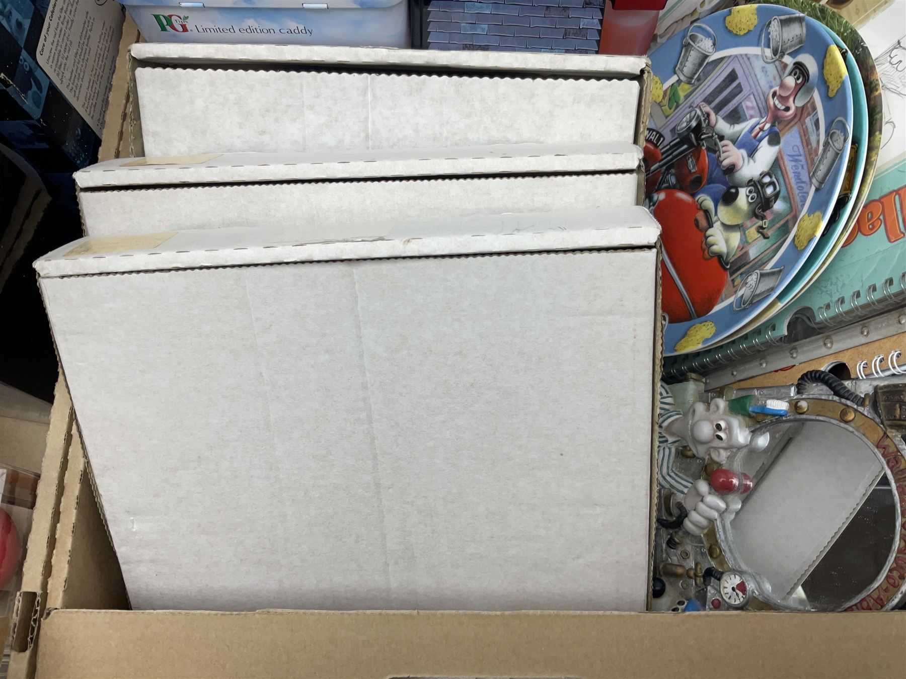 Wallace and Gromit and Shaun the Sheep collectables, including alarm clocks, plates, cafetiere, soft toys, etc, in two boxes