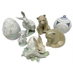 Five Lladro figures, comprising Bear Seated no 1206, Good Bear no 1205, Washing up no 5887, Rabbit Eating no 4772 and A Friend for Life no 7685, together with Lladro Christmas ball no 1603 and Lladro easter eggs 1994 no 17532, all with original boxes, largest example H12cm