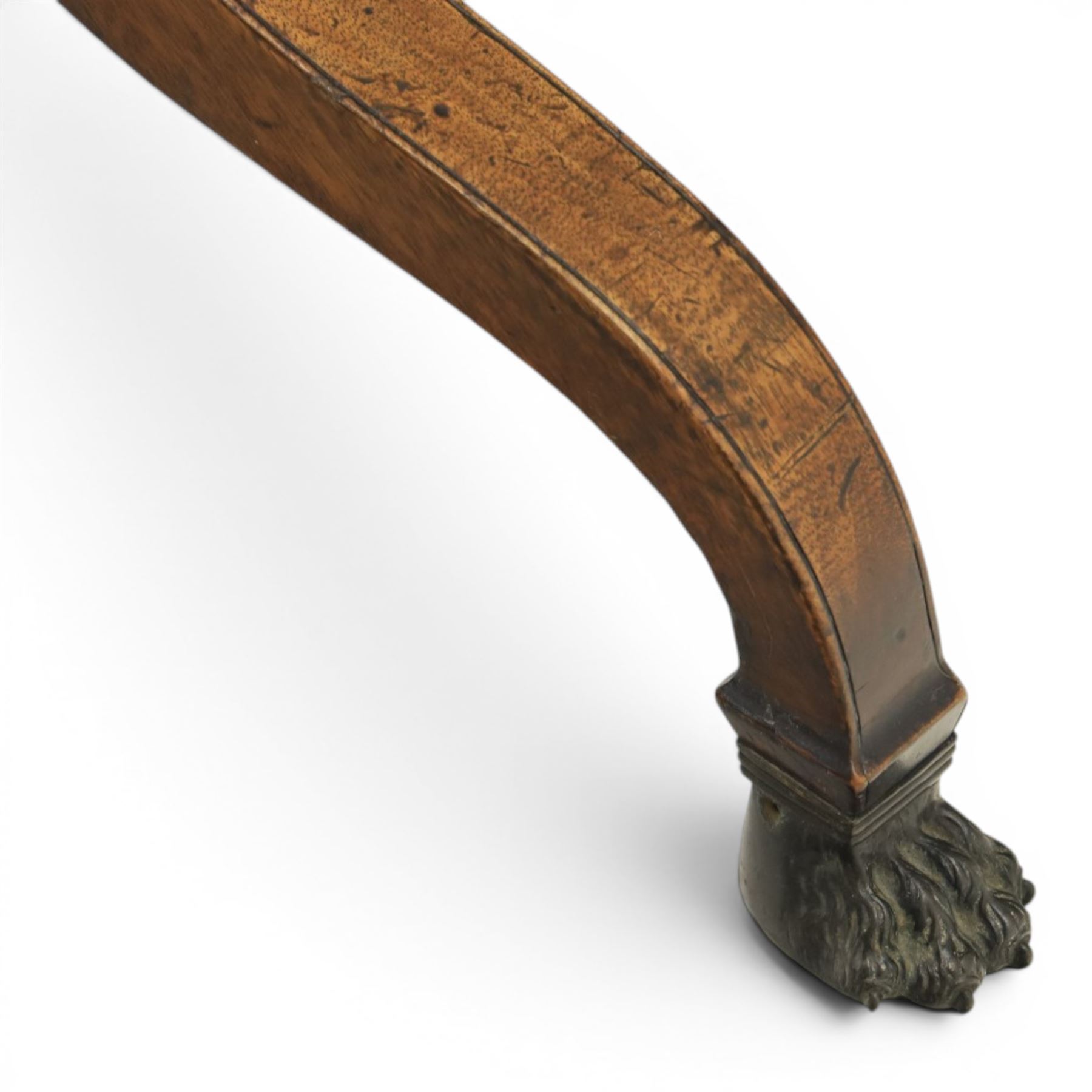 George III mahogany tripod table, rounded rectangular tilt top, raised on a turned column, on splayed supports, terminating brass claw feet above castors