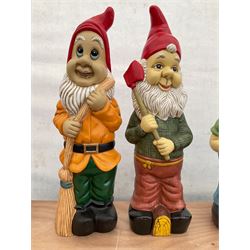 Pair of large indoor or outdoor painted garden gnomes  - THIS LOT IS TO BE COLLECTED BY APPOINTMENT FROM DUGGLEBY STORAGE, GREAT HILL, EASTFIELD, SCARBOROUGH, YO11 3TX