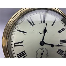 Seth Thomas ship's bulkhead clock with brass bezel and japanned case, the white dial with Roman numerals and subsidiary seconds dial D23.5cm; with key