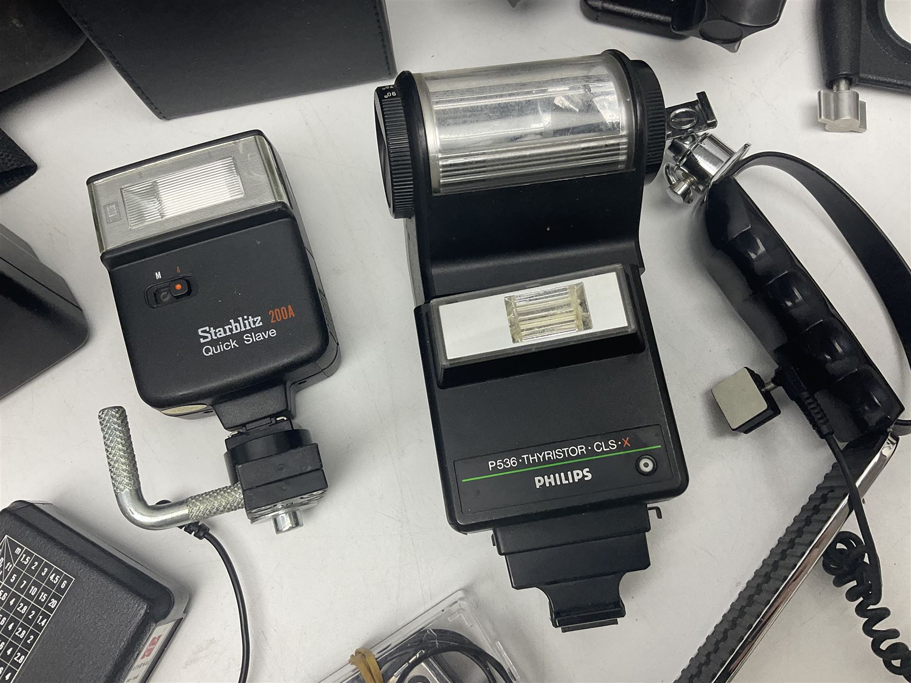 Yukon rubber armoured compact variable power spotting scope (boxed), together with Bresser 10x50 binoculars, Bushnell Excursion 10x42 binoculars, camera equipment etc  