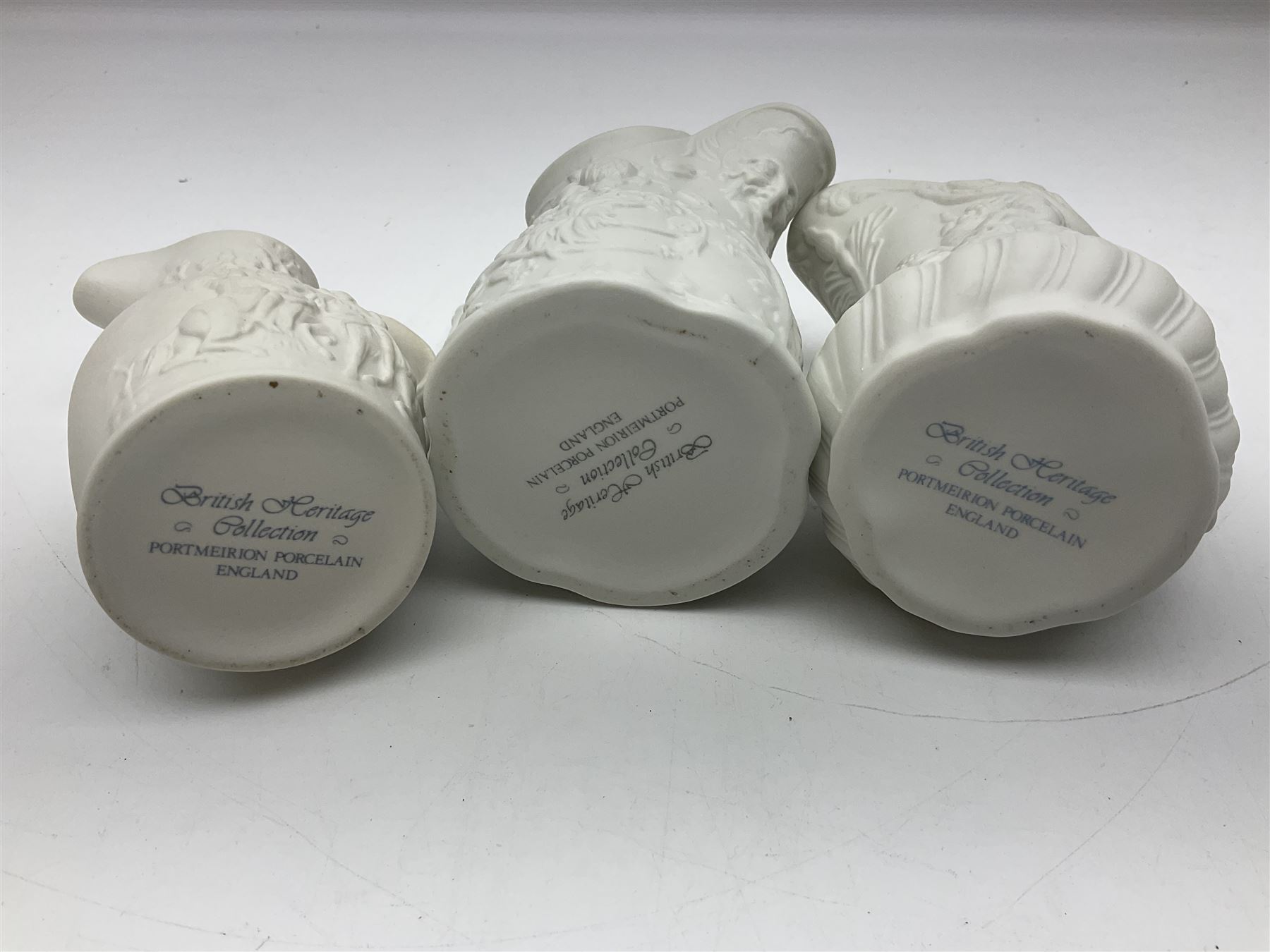  Six Portmeirion British Heritage Collection parian jugs, of various designs, H12cm