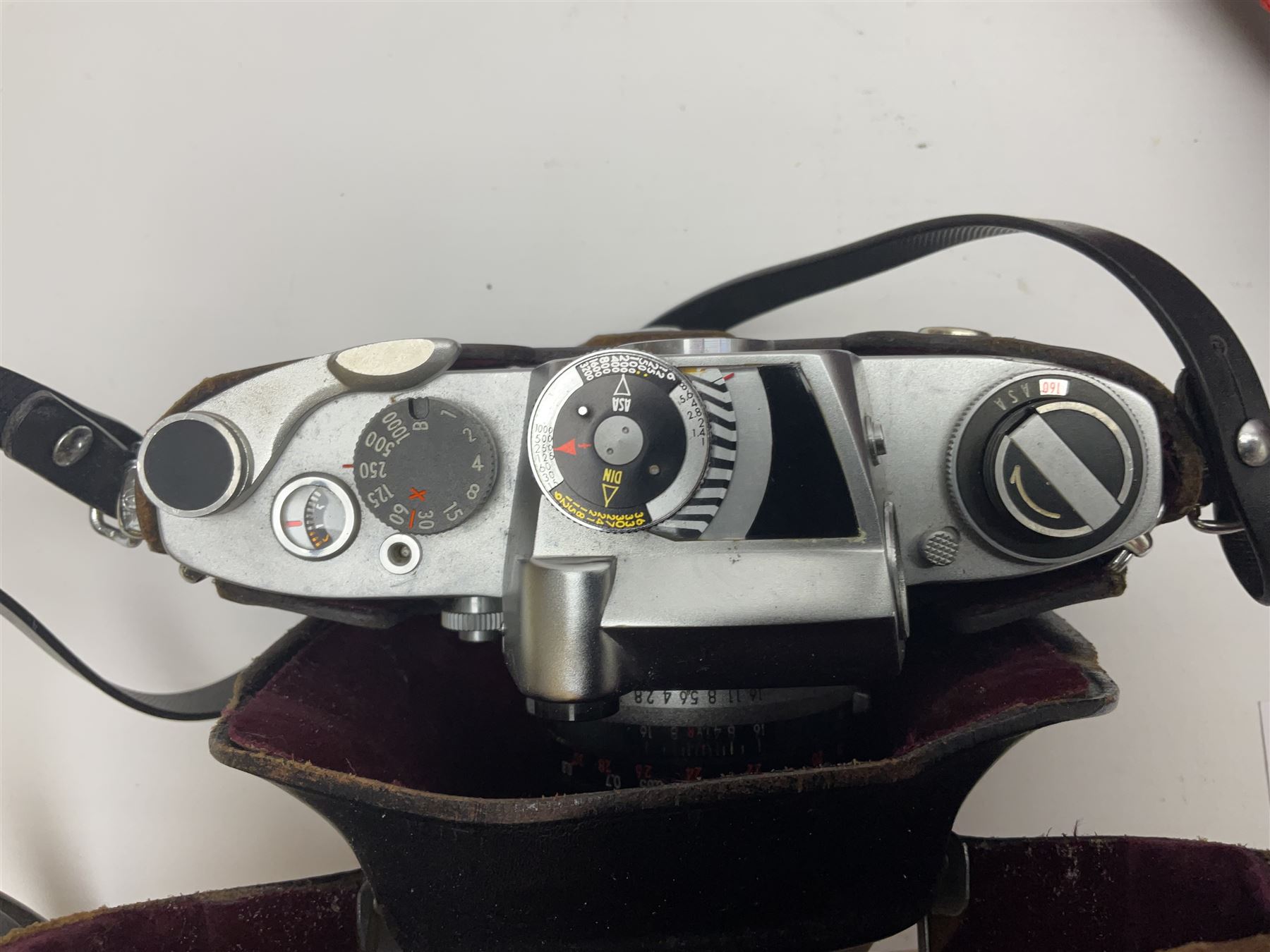 Cameras and accessories, to include Olympus OM101 Power Focus camera body, serial no 1076067, with 'Sigma AF Zoom 1:38, f=75 200mm' lens, serial no 2053714, Canon EOS 5000 camera body, serial no 1507812, with 'Canon Zoom EF 80-200mm, 1:4.5-5.6' lens, other cameras, by Miranda, Coronet and Ricoh and a collection of lenses, carry cases, etc 