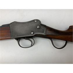 Manton .577/450 Martini Henry rifle, the 82.5cm smooth bored barrel proofed for shot, two barrel bands and bayonet fitting, engraved action with side safety, figured walnut stock with chequered steel butt plate, complete with ramrod, NVN other than 5346 on barrel, L125cm