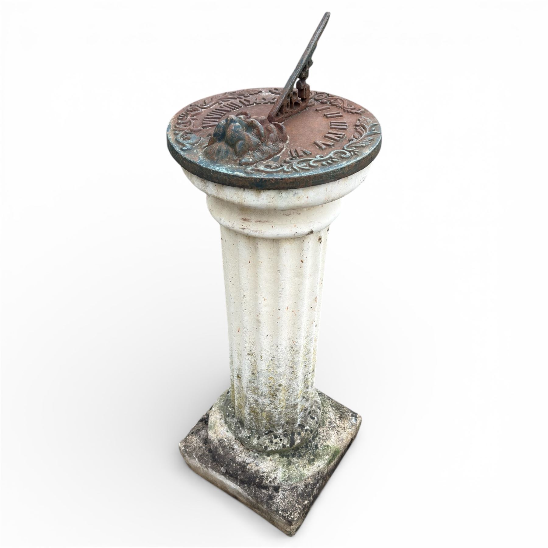 Cast stone garden sundial featuring a cast iron top with Roman numerals and lions head motif