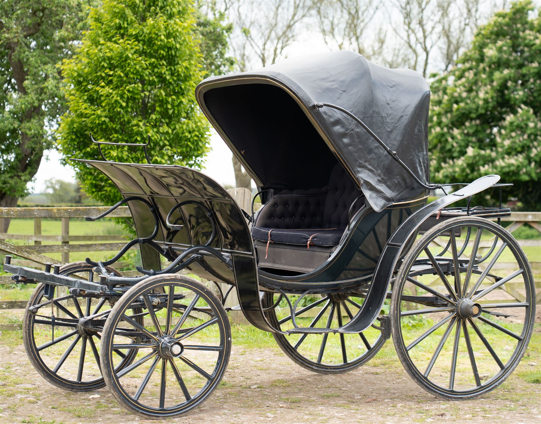 George IV Phaeton Carriage by Mills, Paddington, London

A George IV four wheeled phaeton carriage by Mills, Paddington, London, the hubs stamped accordingly, with black painted bodywork, folding black leather hood, upholstered passenger compartment and rear luggage platform. The carriage is fitted with wooden spoked wheels, yellow coachlining, leaf spring suspension, front mudguards, metal footrests and shafts for single horse use. In original condition by one of the best carriage builders of the day

Features

• Maker’s hubs marked Mills, Paddington, London
• Four wheeled phaeton carriage
• Black painted bodywork with fine yellow coachlining
• Folding black leather hood
• Button upholstered passenger seating
• Rear luggage platform with rail
• Wooden spoked wheels with rubber tyres
• Leaf spring suspension
• Shafts for single horse use
• Front mudguards and metal footrests
• Fitted with a side mounted ratchet hand brake operating on the rear wheel


Dimensions:
Overall length: 305 cm
Width: 160 cm
Height: 213 cm

Wheel Diameters:
Front wheels: 77 cm
Rear wheels: 107 cm

Seating:
Driving seats: 1
Passenger seats: 2